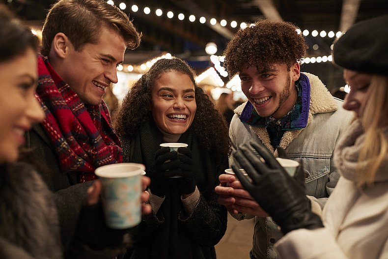 Friends drinking mulled wine